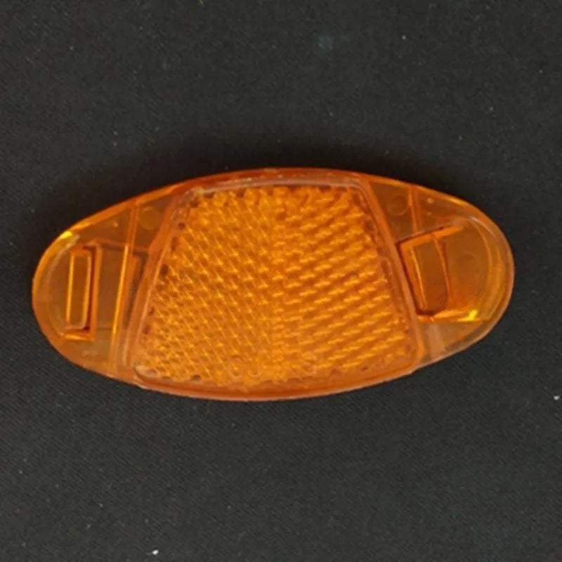 Bicycle spoke reflector set showing four plastic units in yellow colour with dimensions 7.2cm by 3.5cm
