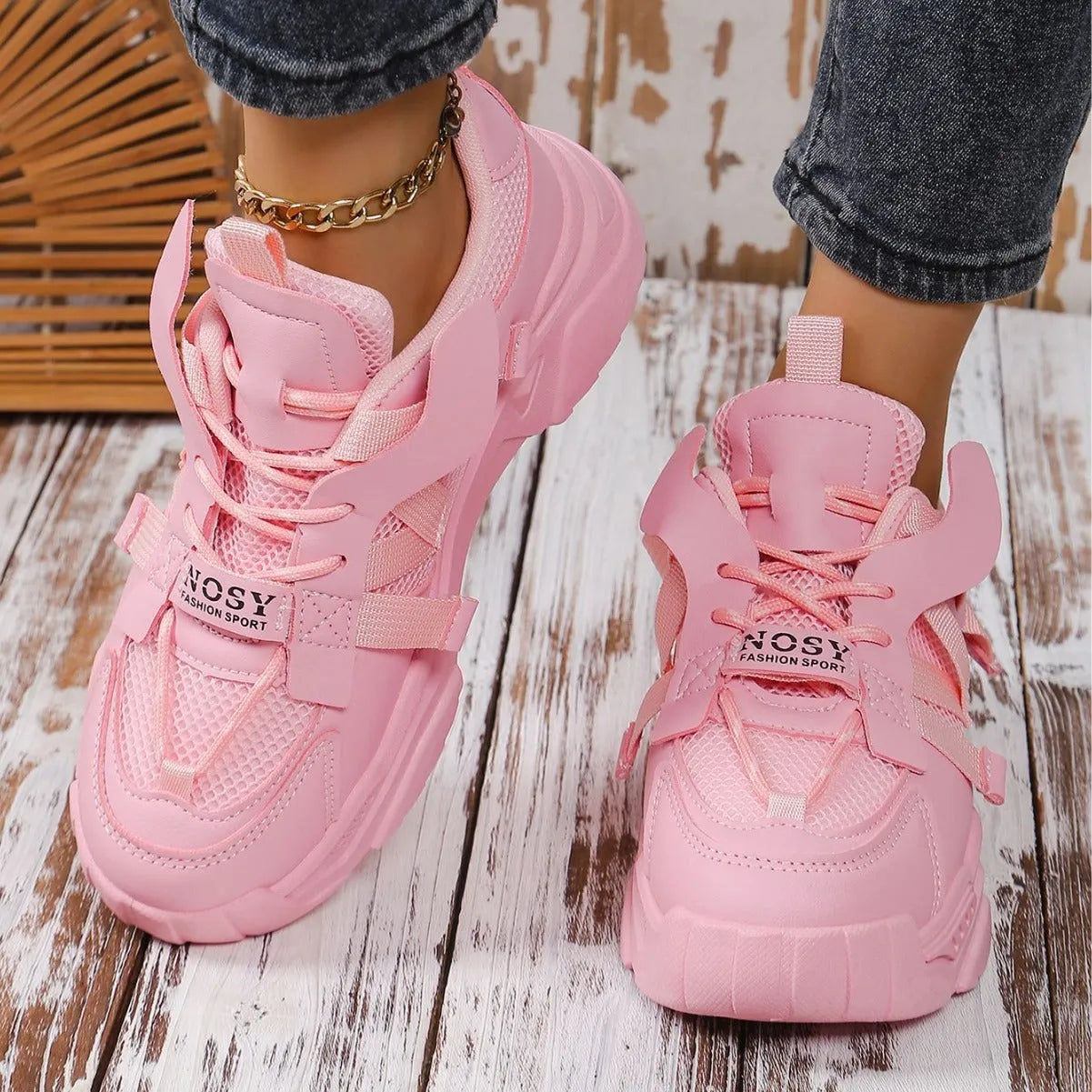 Women's platform mesh dad sneakers in various colours on a white background.
