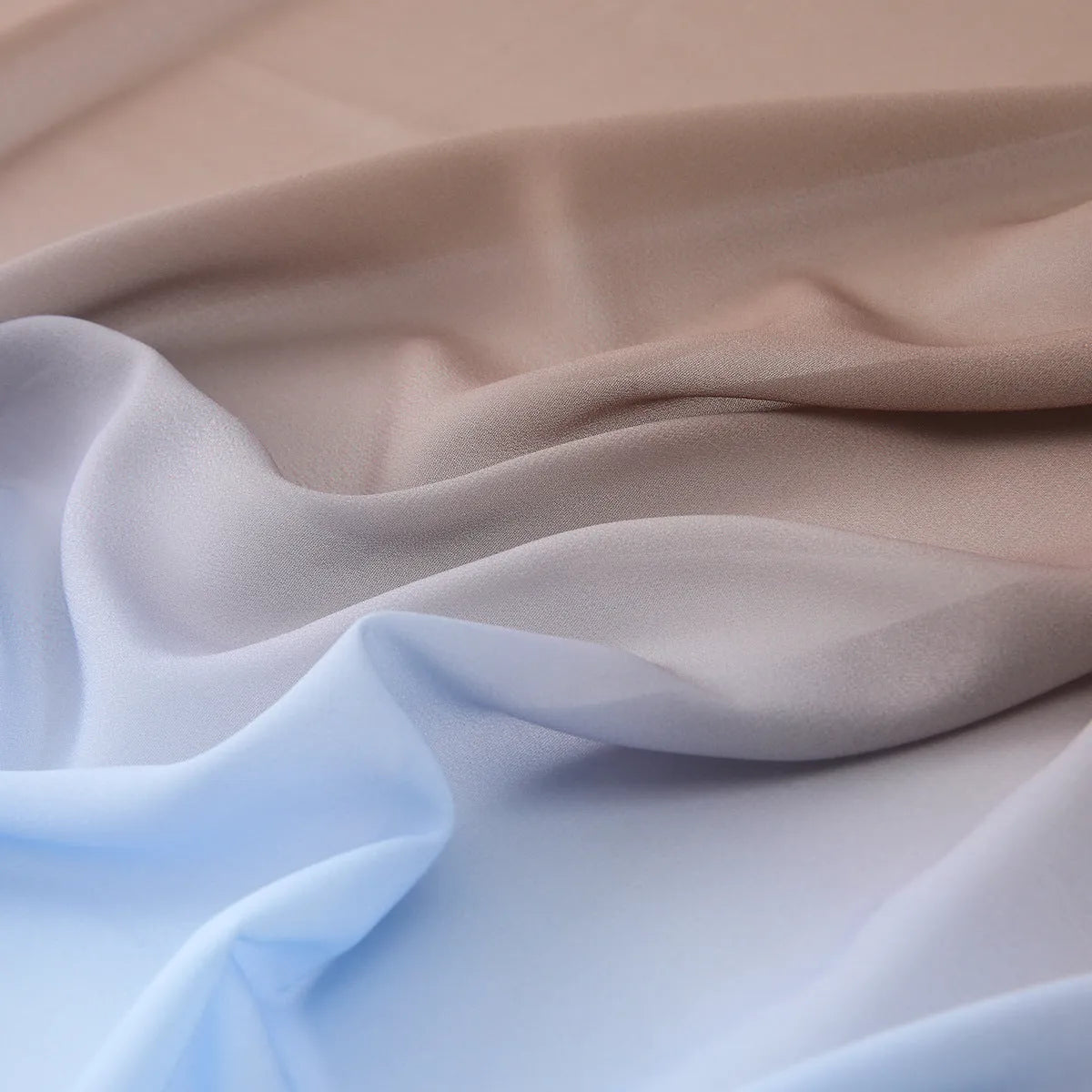 Long lightweight chiffon scarf with bubble towel texture draped to show its length and soft drape.