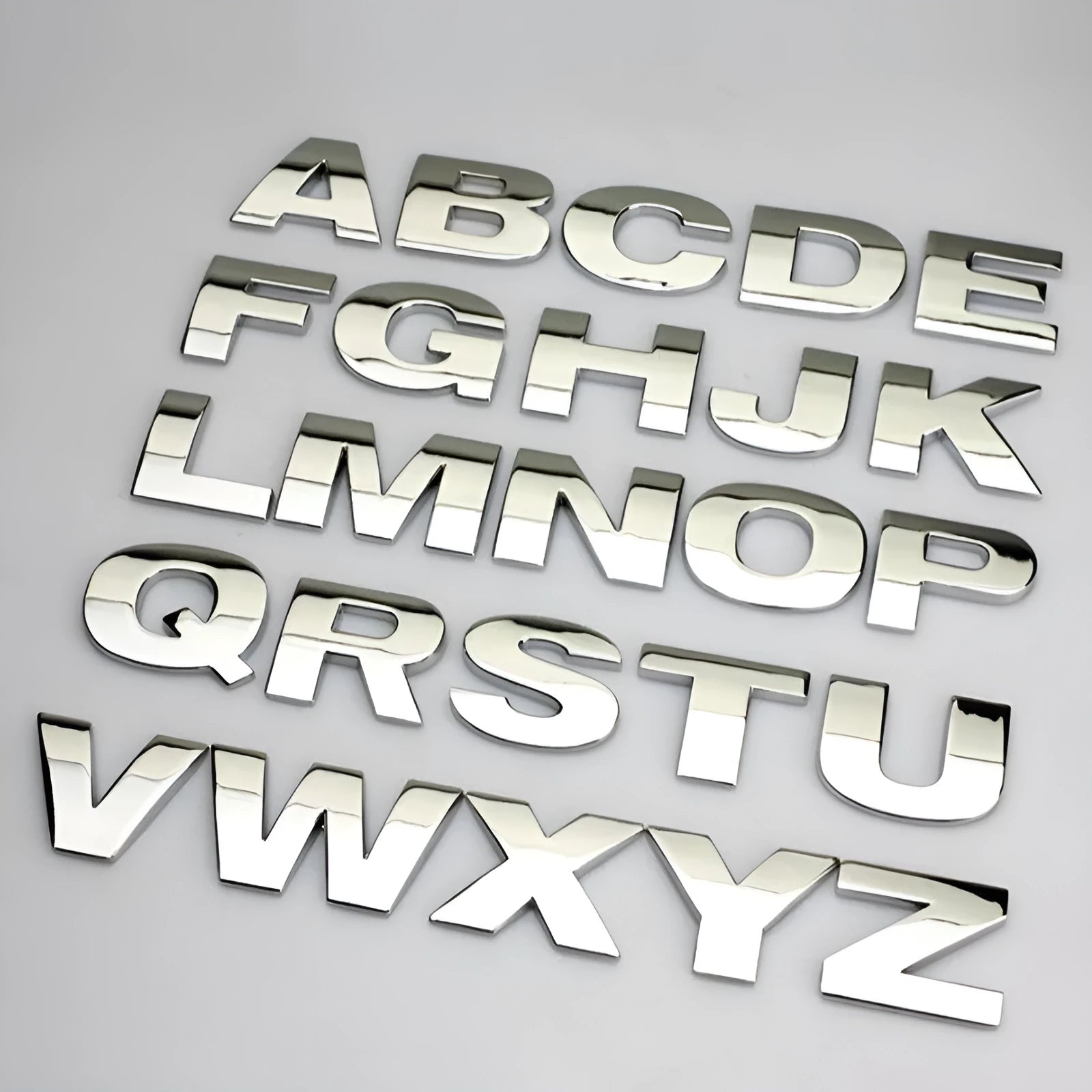 3D metal car bumper sticker showing zinc alloy English letter with black finish, approximately 2.5cm in size