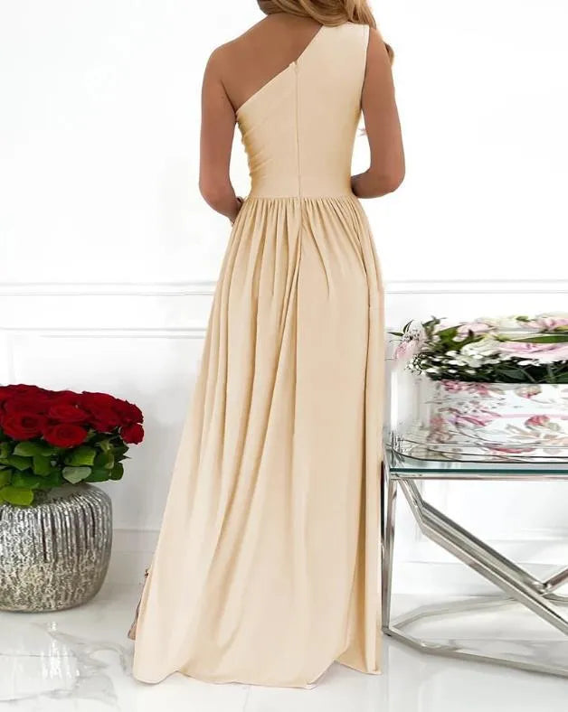 Women's one shoulder sleeveless maxi dress with cutout and high side split in soft fabric.