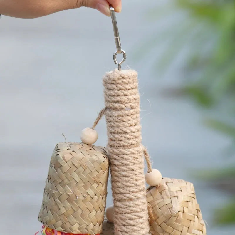 Wooden frame parrot toy with sisal rope and colourful shredded paper strips measuring 15cm by 35cm