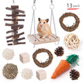 Assortment of natural wooden and woven grass toys for rabbits, guinea pigs, and parrots