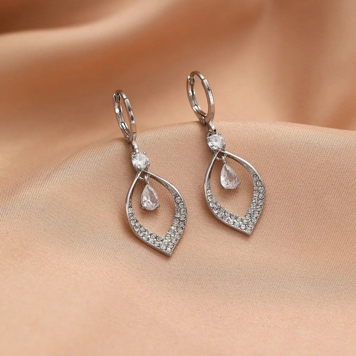 Women's gold and silver zircon water drop tassel earrings made from electroplated copper