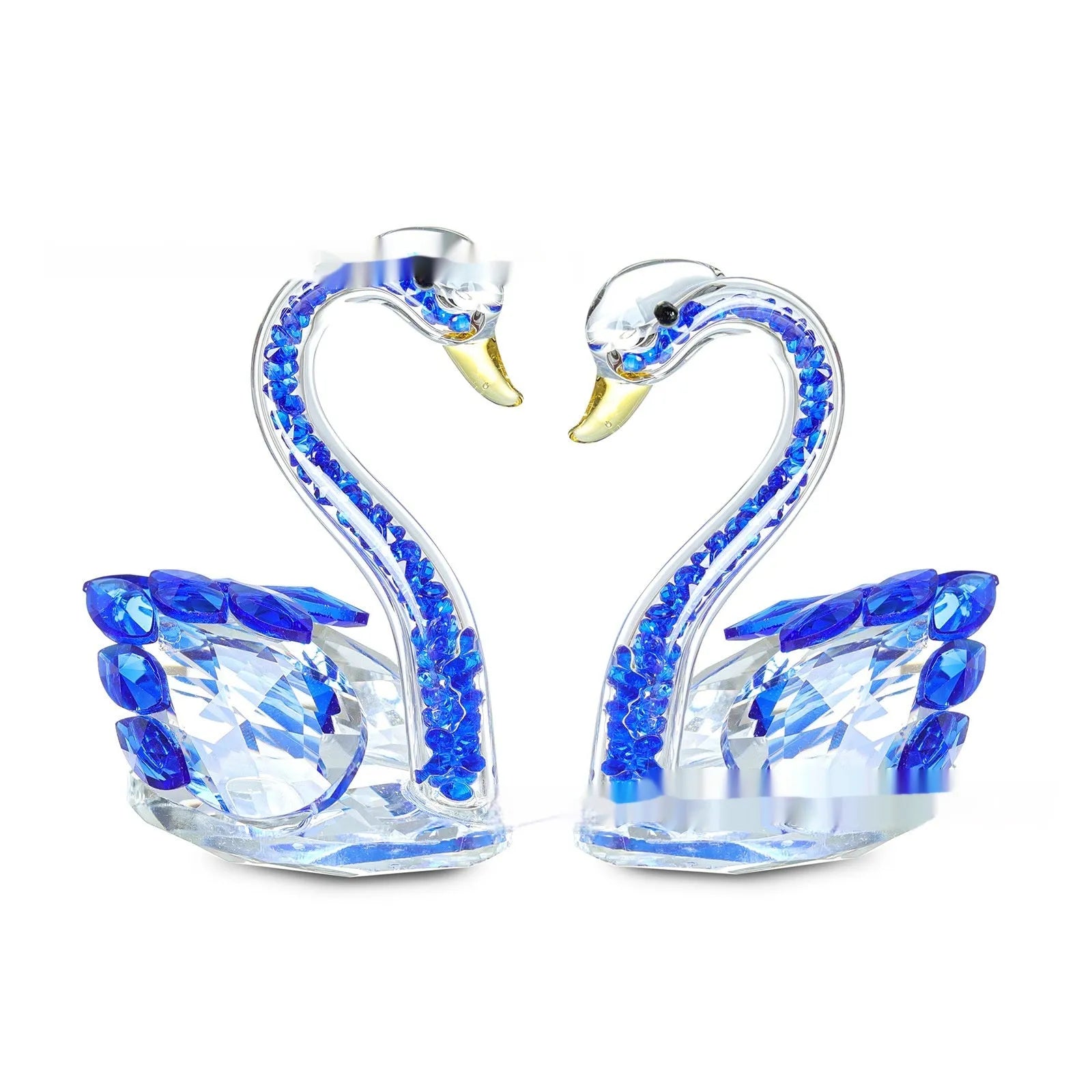 White crystal swan decoration on desktop with red, blue, pink, and violet colour options