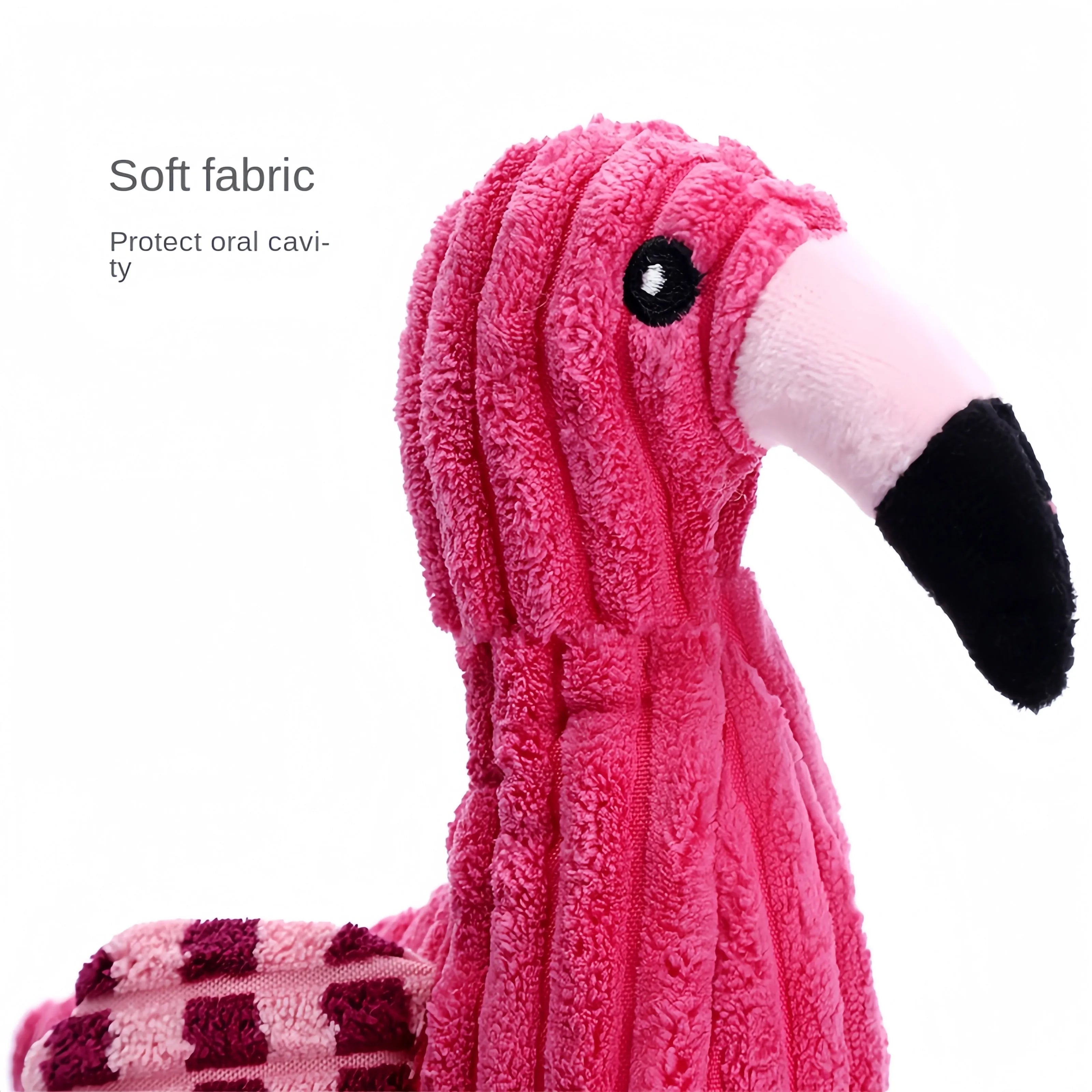 Pink animal-shaped plush dog toy with corduroy fabric and internal squeaker for small and large breed dogs