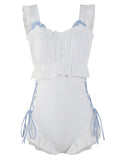 Women's milky white backless one-piece nylon swimsuit on a model.