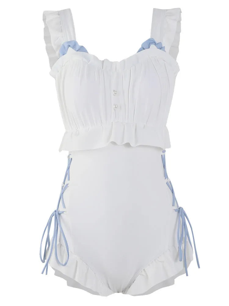 Women's milky white backless one-piece nylon swimsuit on a model.