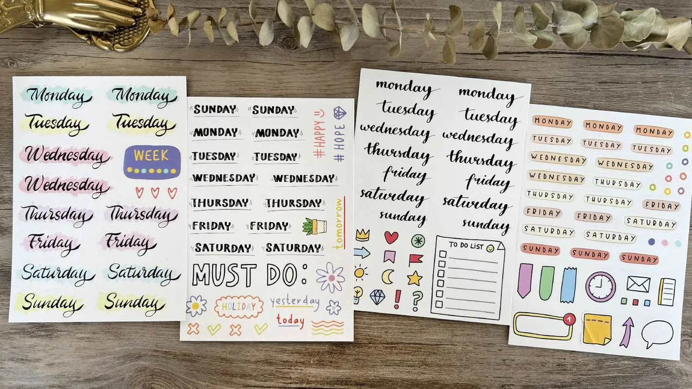 Set of printed English letter, number, and weekly word decoration stickers in assorted colours, laid out flat.