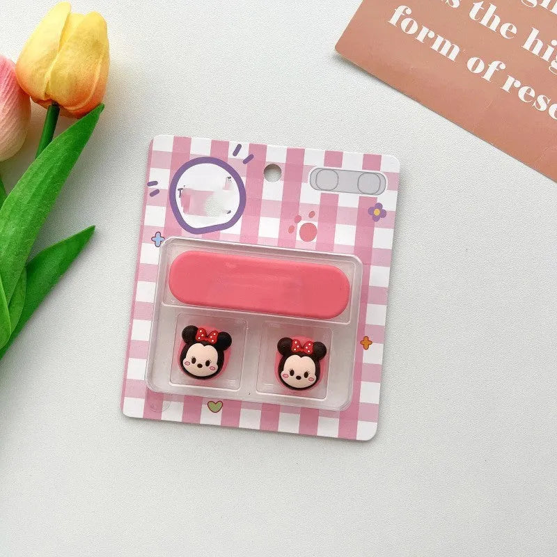 Colourful cartoon-style plastic fixer for organising a magnetic data cable on a desktop