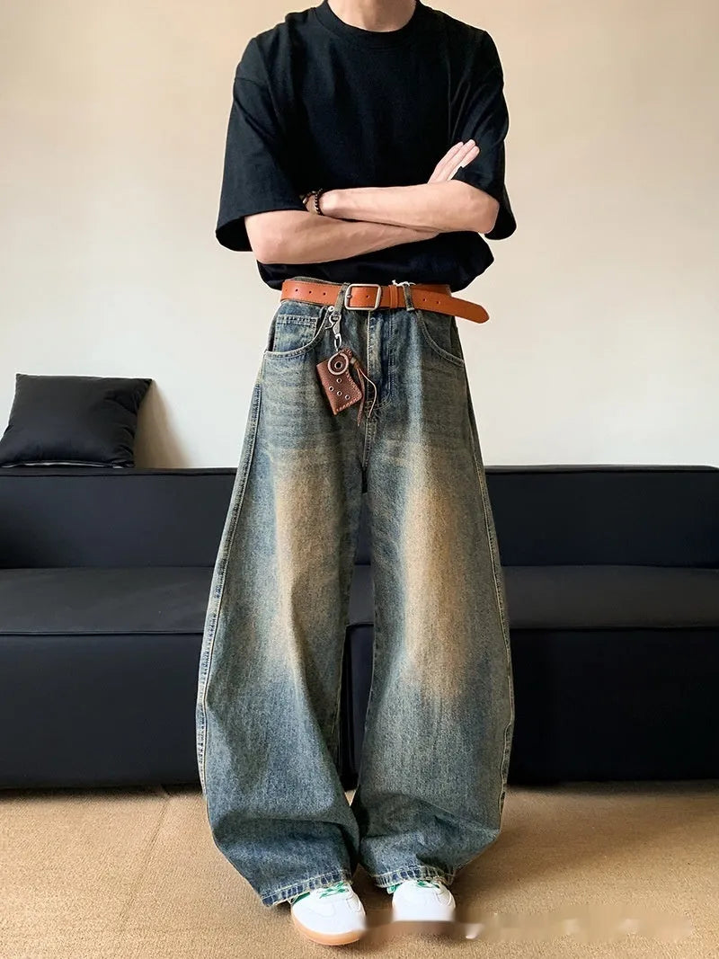 Men's retro blue distressed slim-fit wide-leg jeans on a model
