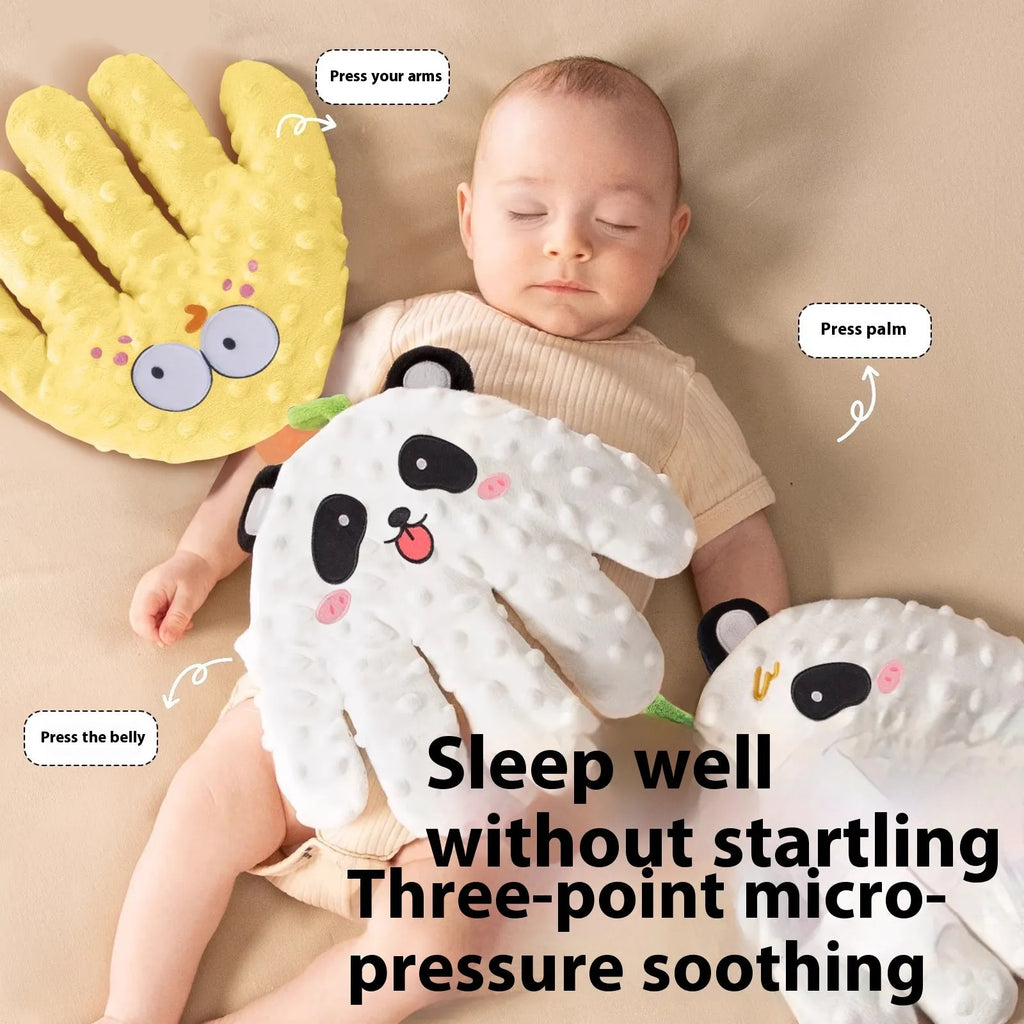 Electric pat shock big palm doll in cute panda style with remote control and charging cable on a neutral background