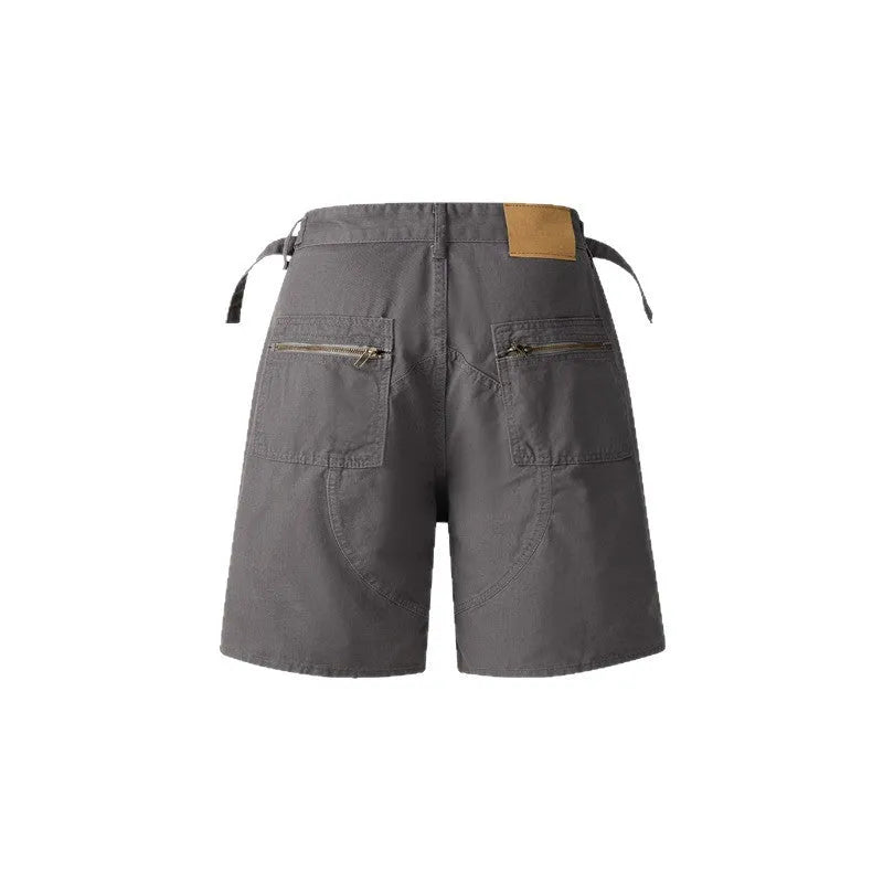 Retro washed cotton workwear shorts with zipper fly in loose fit and fifth pants length