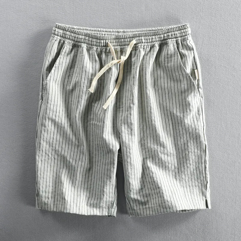 Men's striped cotton casual shorts showing straight-leg design and mid-waist fit