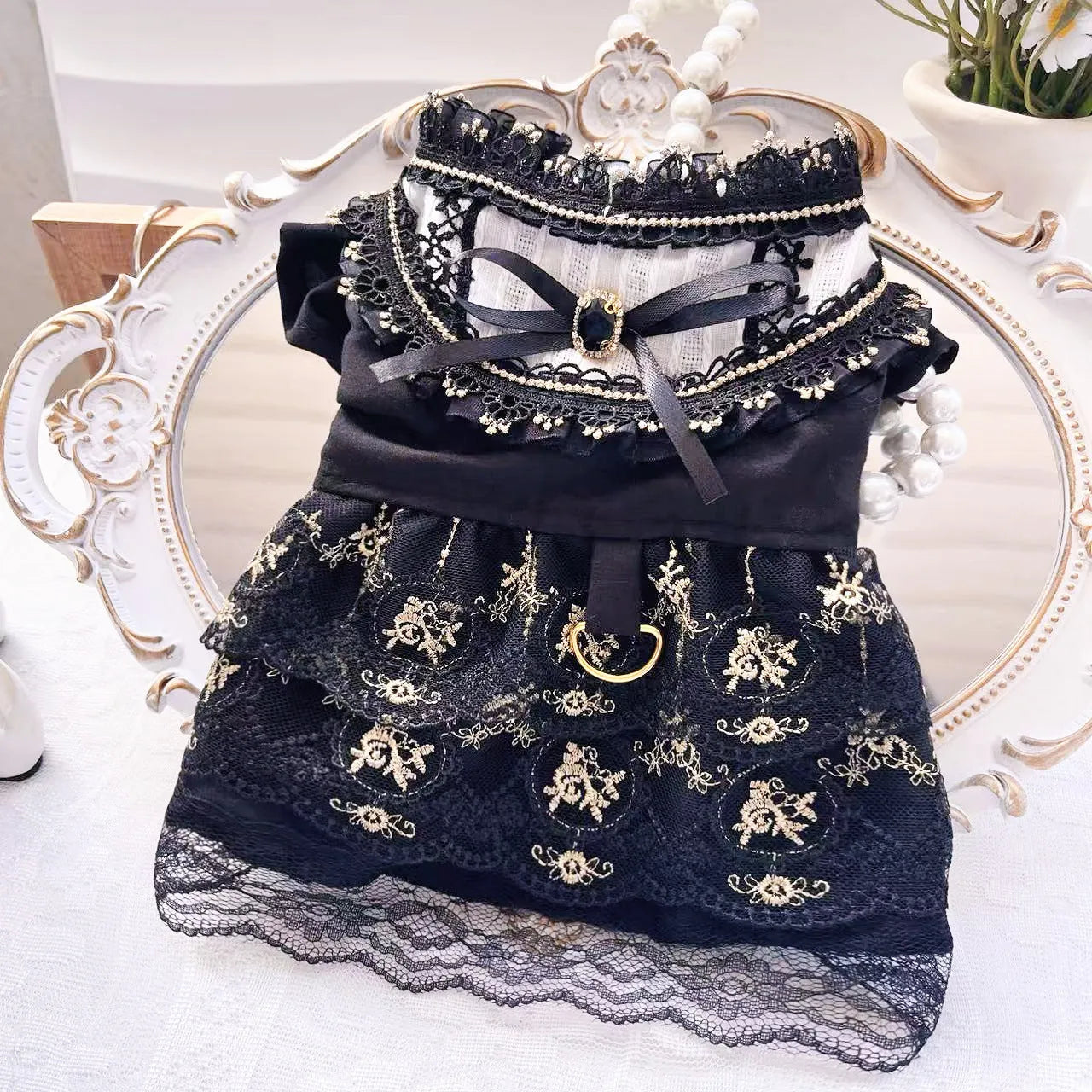Golden gothic-style princess skirt pet clothing for cats or dogs on a mannequin