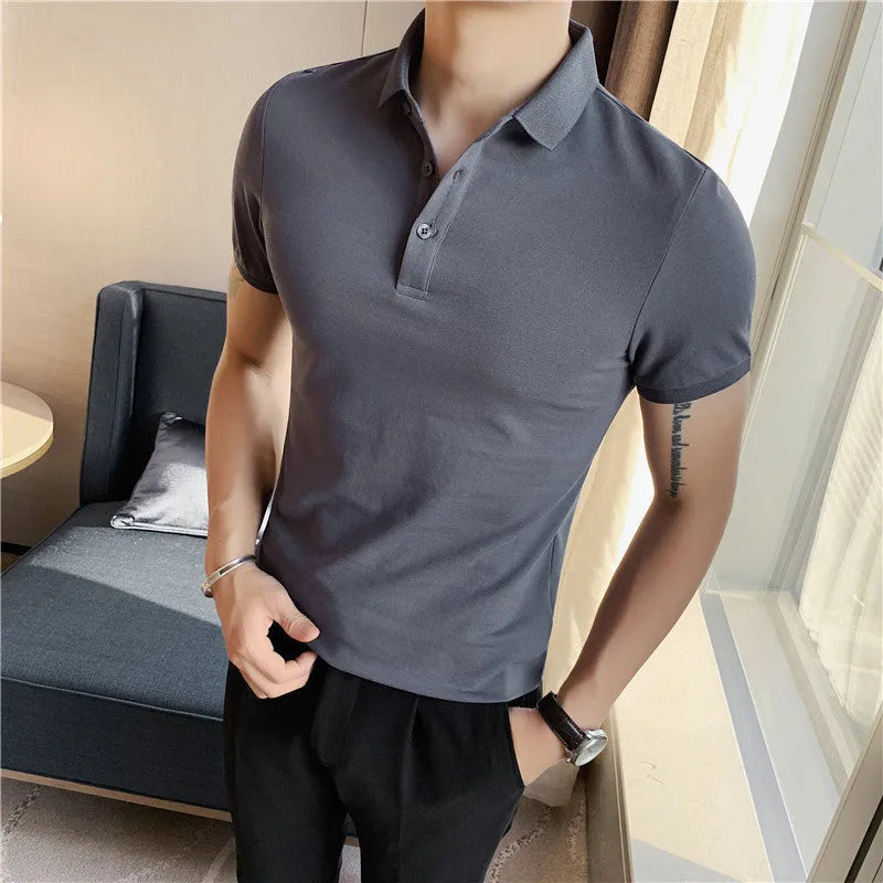 Slim-fit solid colour polo shirt with lapel collar and short sleeves on a hanger.