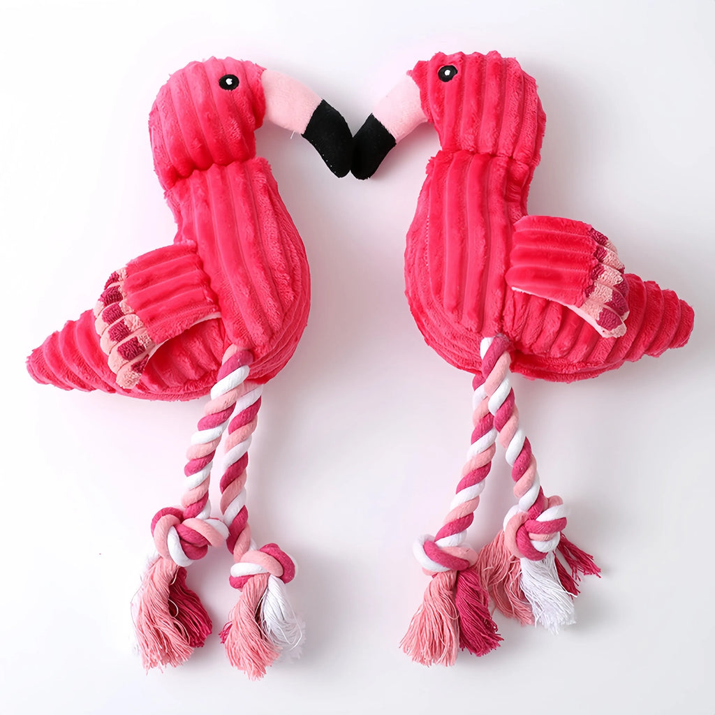 Pink animal-shaped plush dog toy with corduroy fabric and internal squeaker for small and large breed dogs