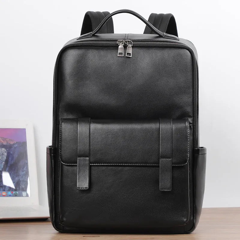 Men's black genuine leather computer backpack with 36-55L capacity and physiological curve back plate
