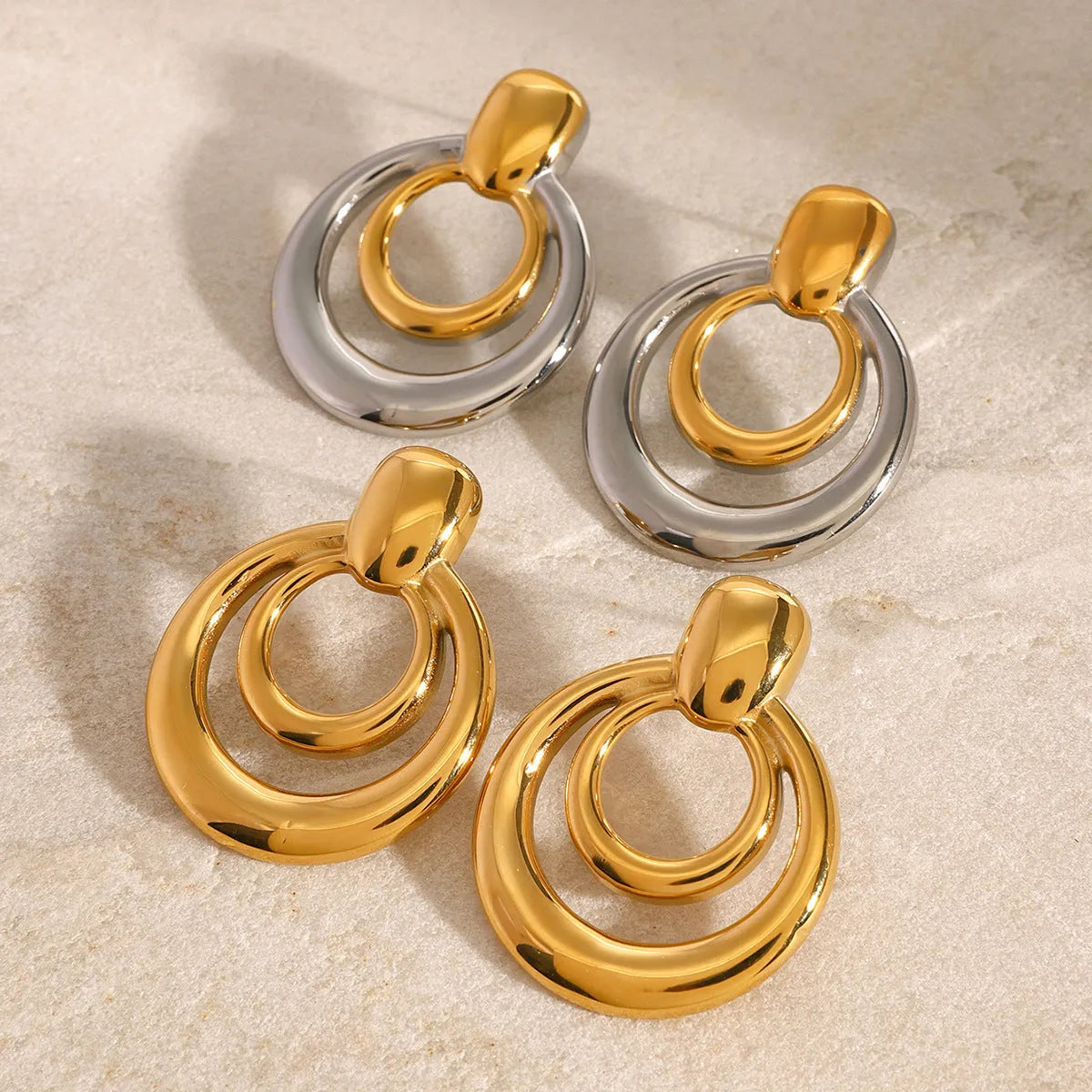 Round geometric double layer hollow stud earrings with 18K gold plating