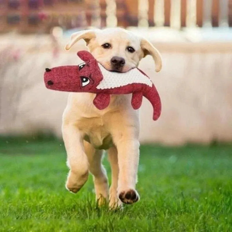 Blue, green, and red corn cob shaped plush dog toy with a textured surface on a white background.