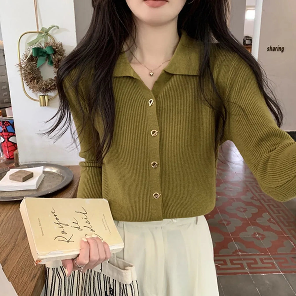 Long sleeved loose fit knitted cardigan top in viscose fibre, shown in beige colour.