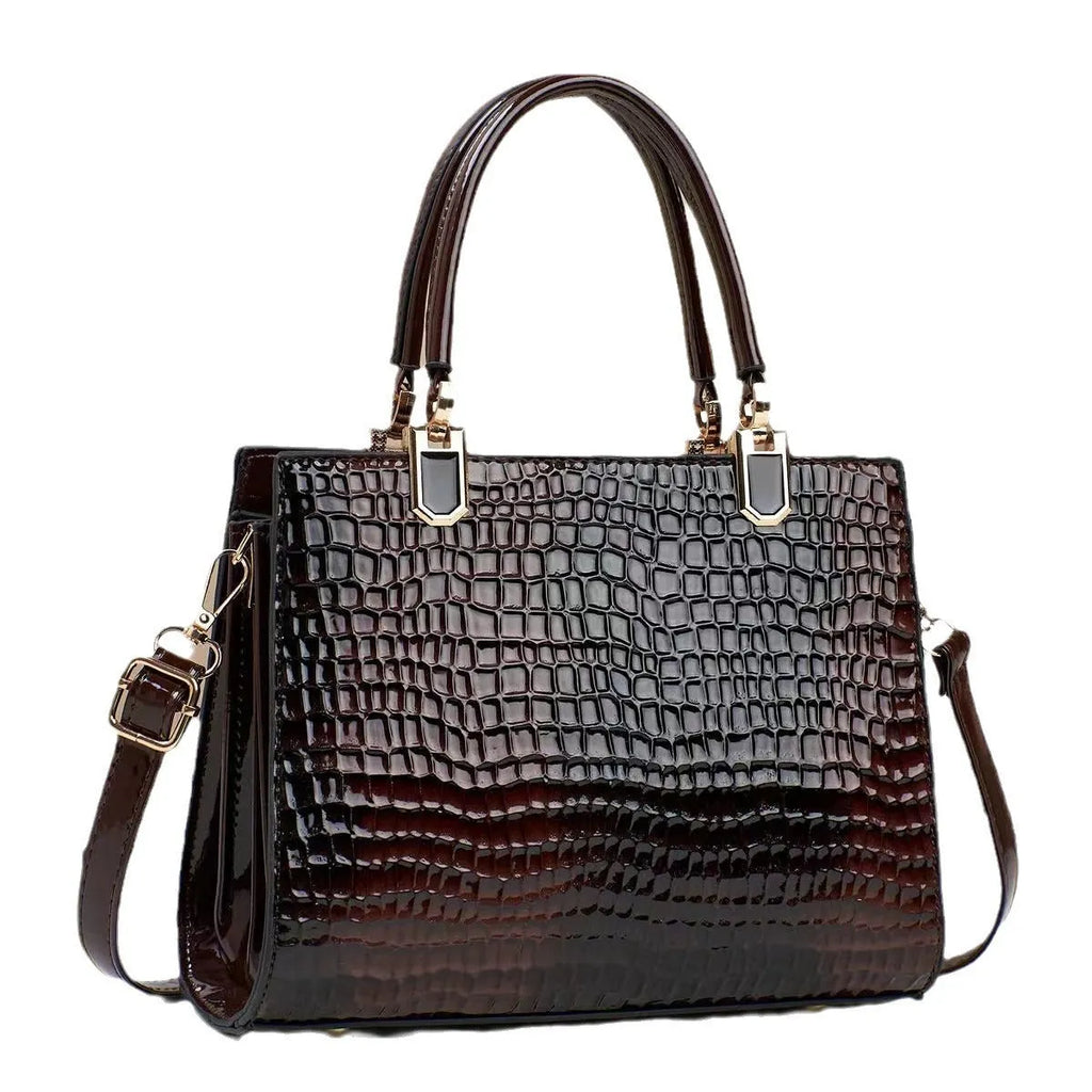 Soft PU leather one shoulder handbag in a horizontal square shape with internal organiser pockets.