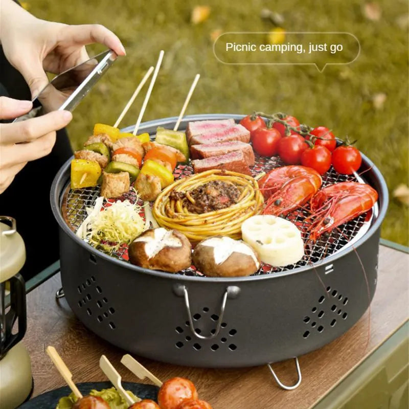 Portable stainless steel barbecue grill with detachable design and storage bag for outdoor cooking