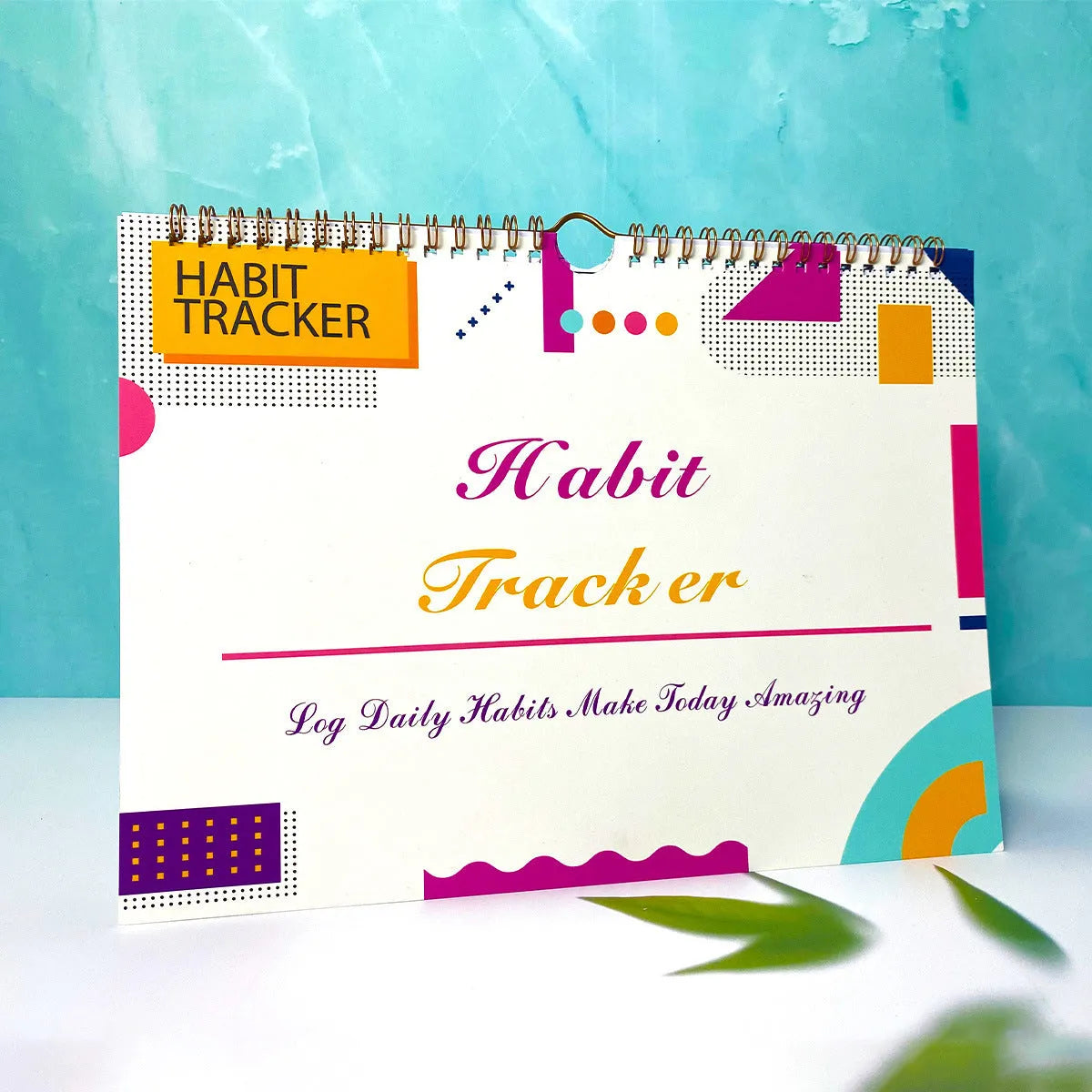 Habit tracking device showing 12 internal pages for schedule planning in various colour options