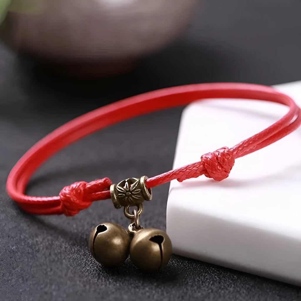 Small dog nylon rope collar with brass bell shown in black, red, and coffee colours.