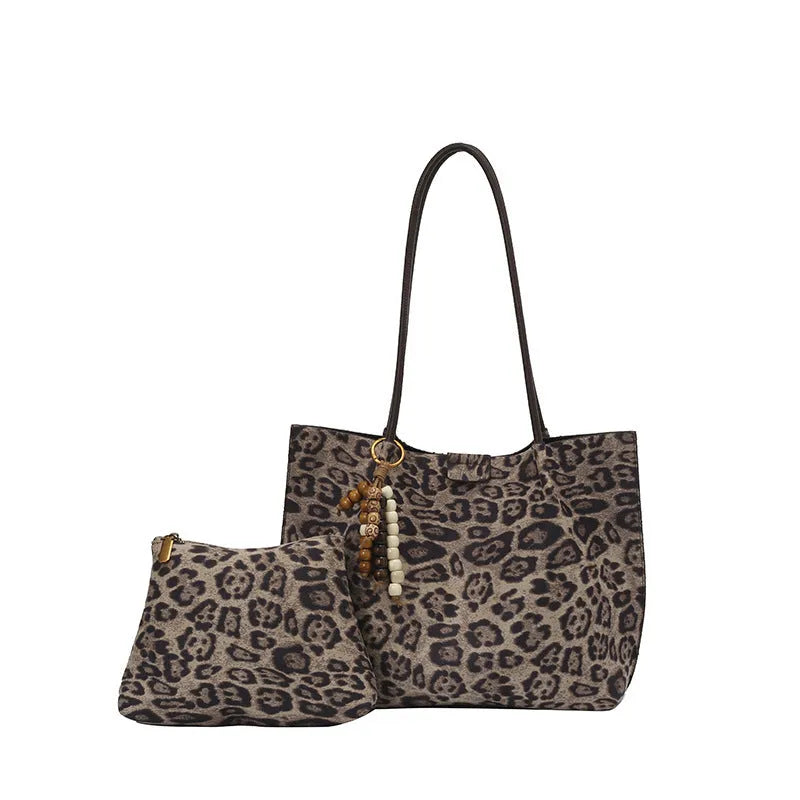 Leopard print polyester hand-held tote bag with double shoulder straps on a white background