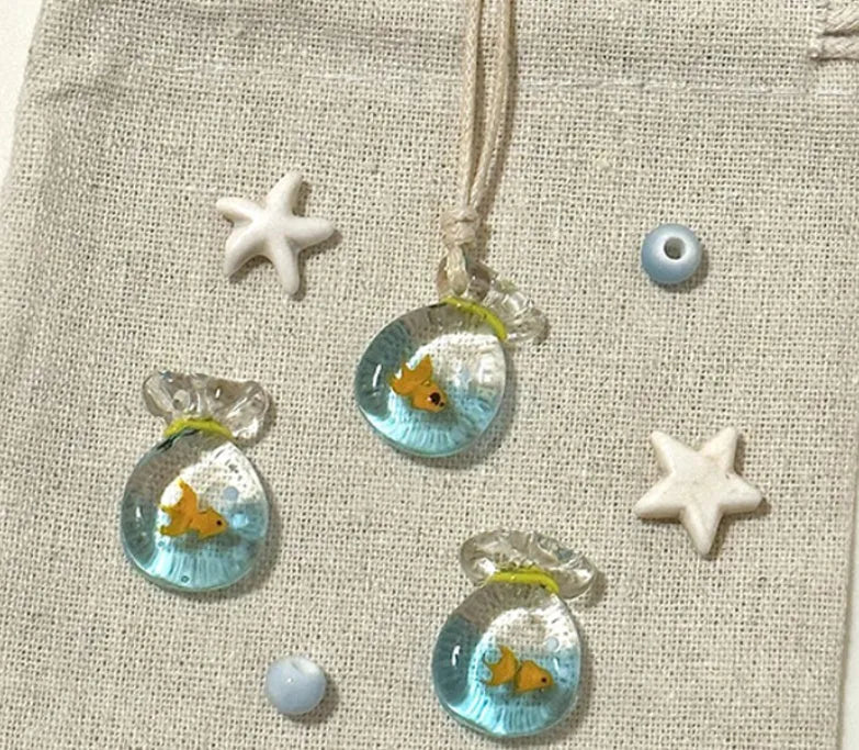 Women's coloured glaze pendant necklace with cotton linen chain featuring Skirt Everyday Joker design