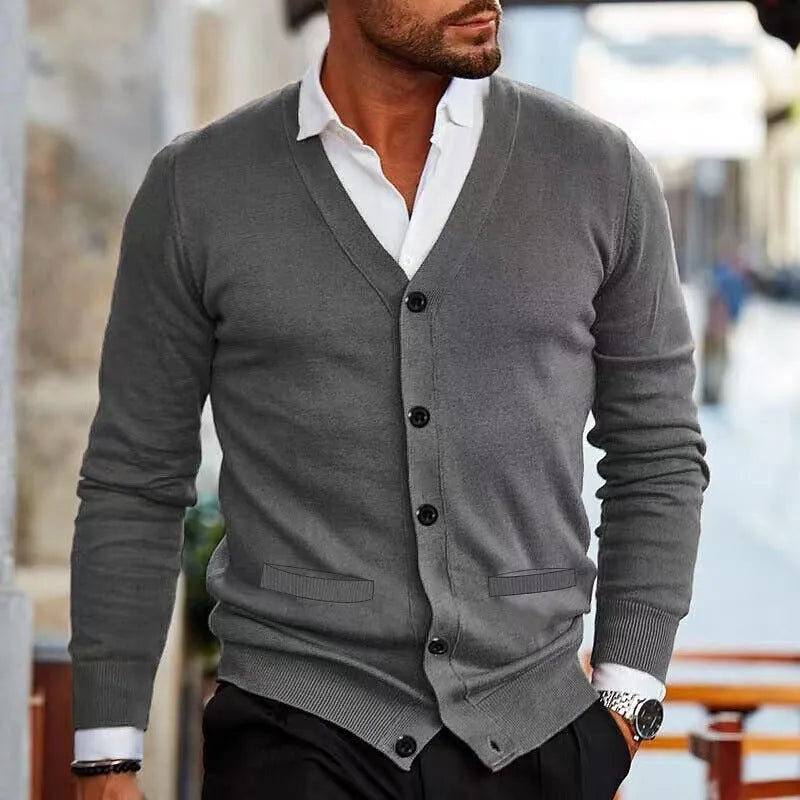 Men's slim fit acrylic cardigan in light grey, shown as a long-sleeved sweater coat open at the front.