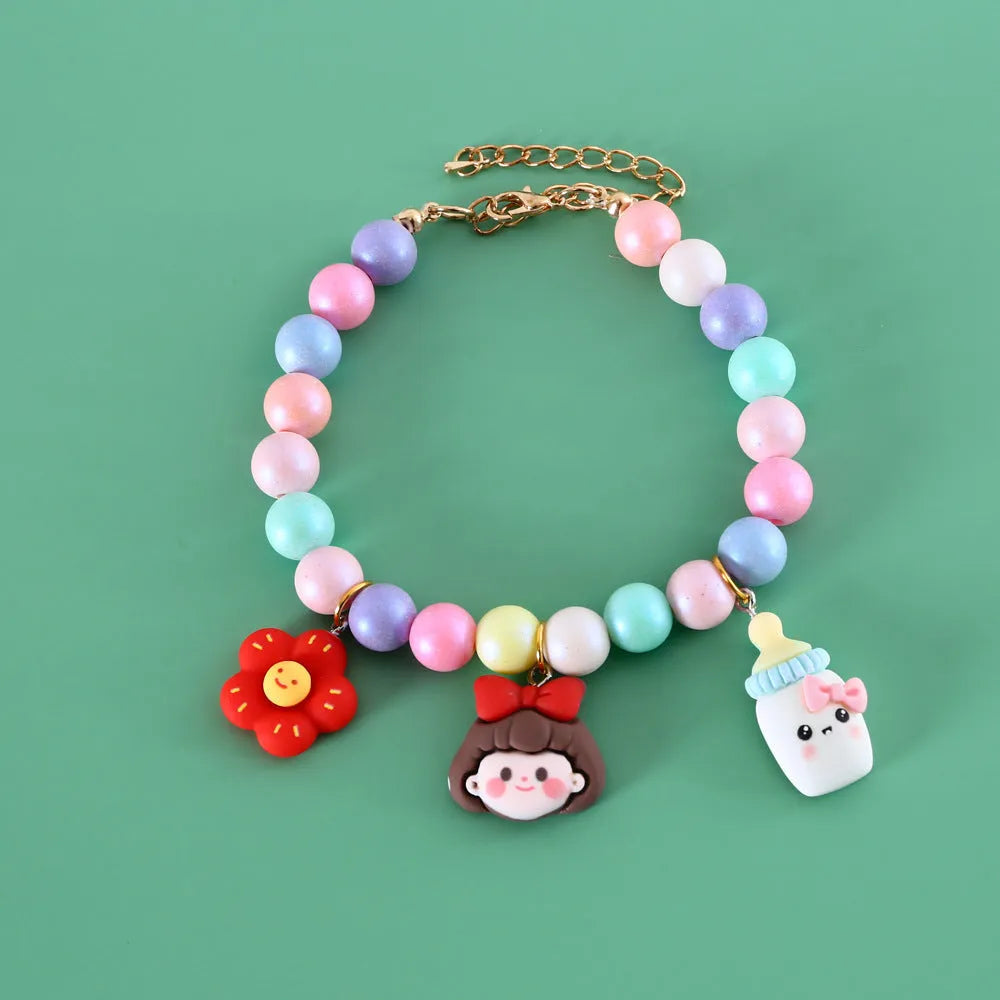 Colourful macaron-themed resin pet jewellery set with adjustable collar and bracelet for dogs and cats