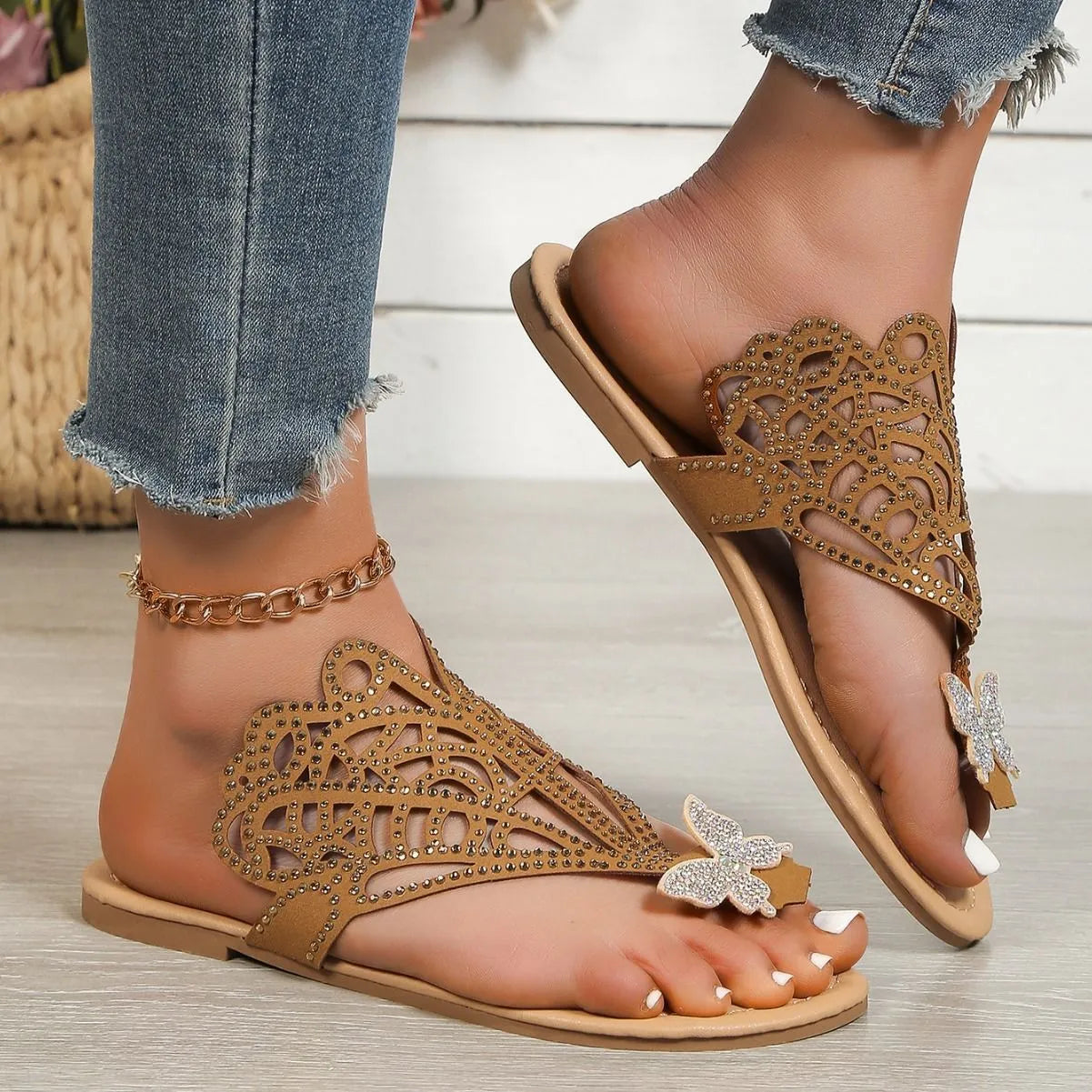 Women's black rhinestone flip-toe sandals with slip-on design and flat rubber sole