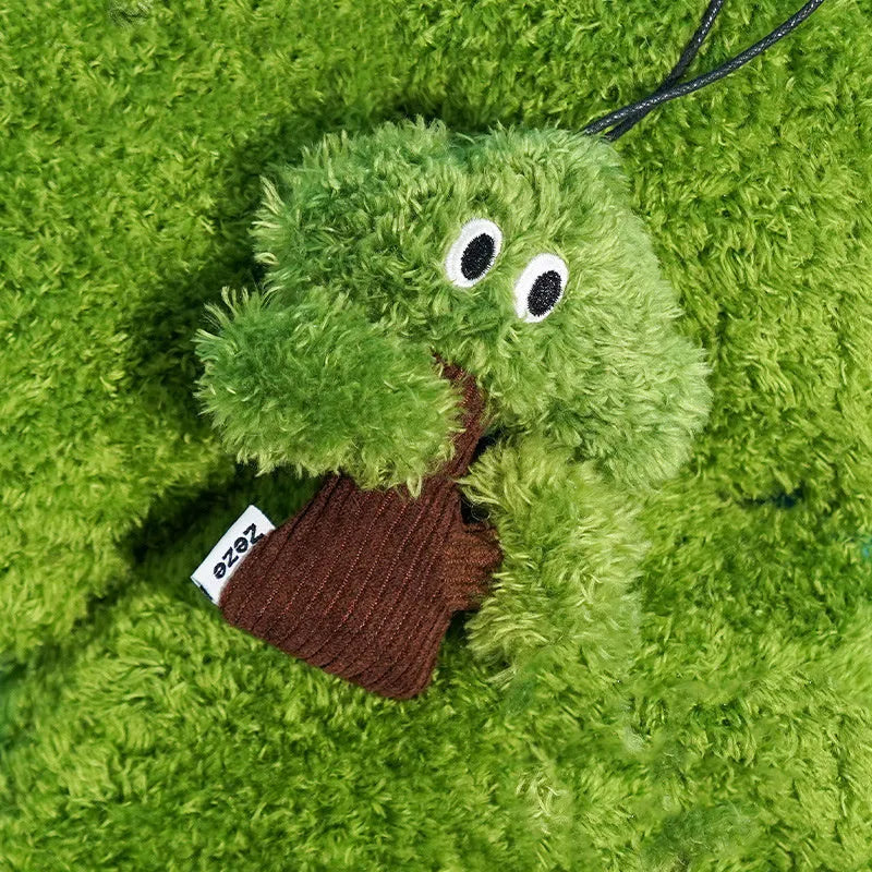 Pine tree shaped cat toy stick with an attached mint-scented bag pendant on a string.
