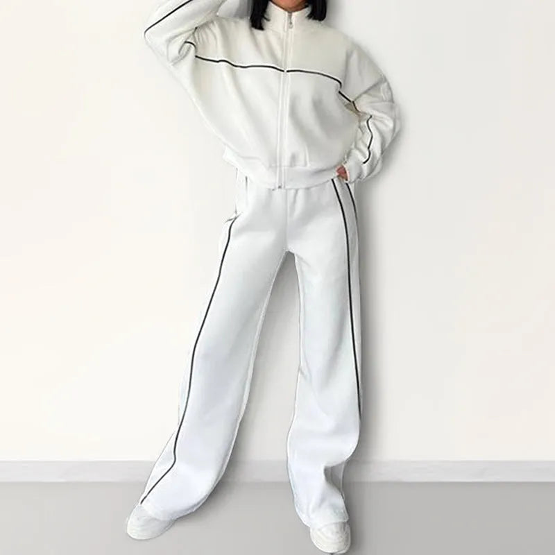 Casual polyester suit set showing a mock neck zip hoodie and matching striped trousers with lace-up detail.