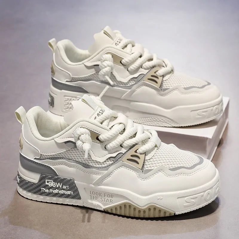 Men's low-top canvas board shoes in a colour-matched pattern with a flat rubber sole.