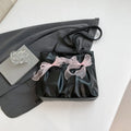 College style large capacity black tote bag with bow detail and double shoulder straps.