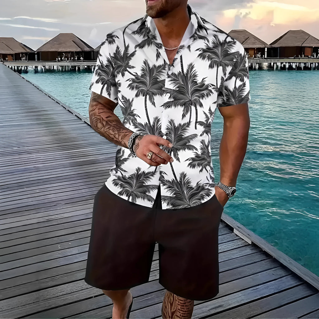 Man wearing a short sleeve Hawaiian print shirt and matching shorts, a casual polyester suit set.