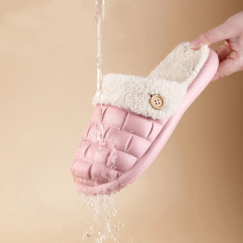 Pair of pink EVA detachable slippers with plush lining and textured anti-skid sole.
