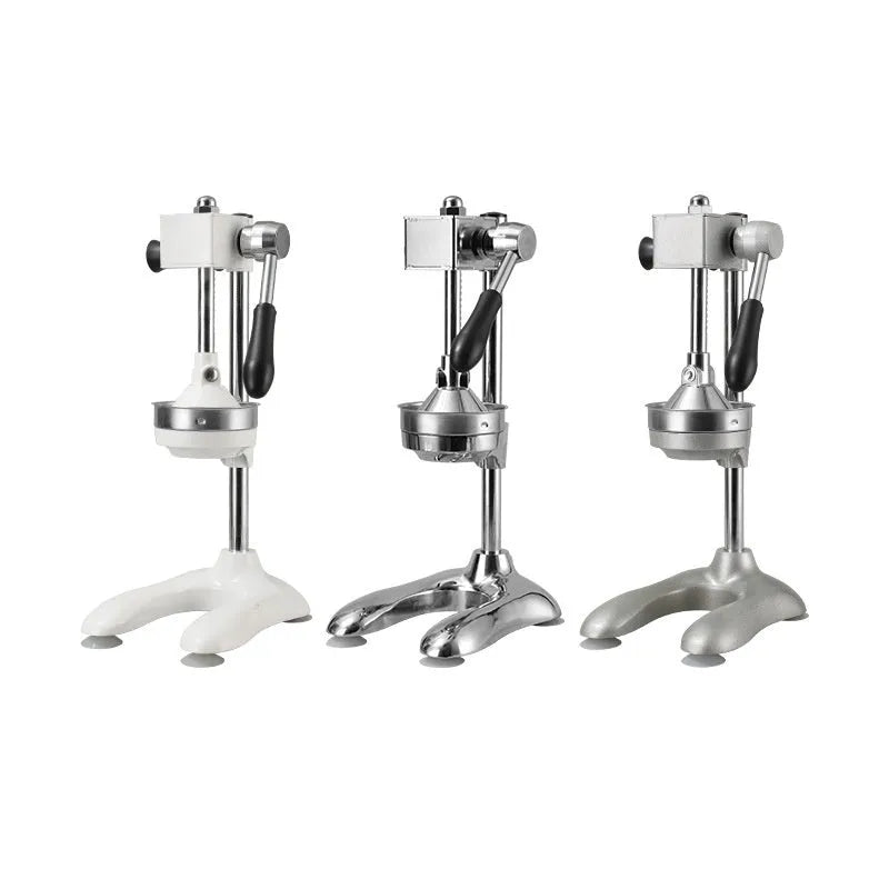 Vertical stainless steel manual juicer on a countertop, shown in silver finish with a pointed head style.