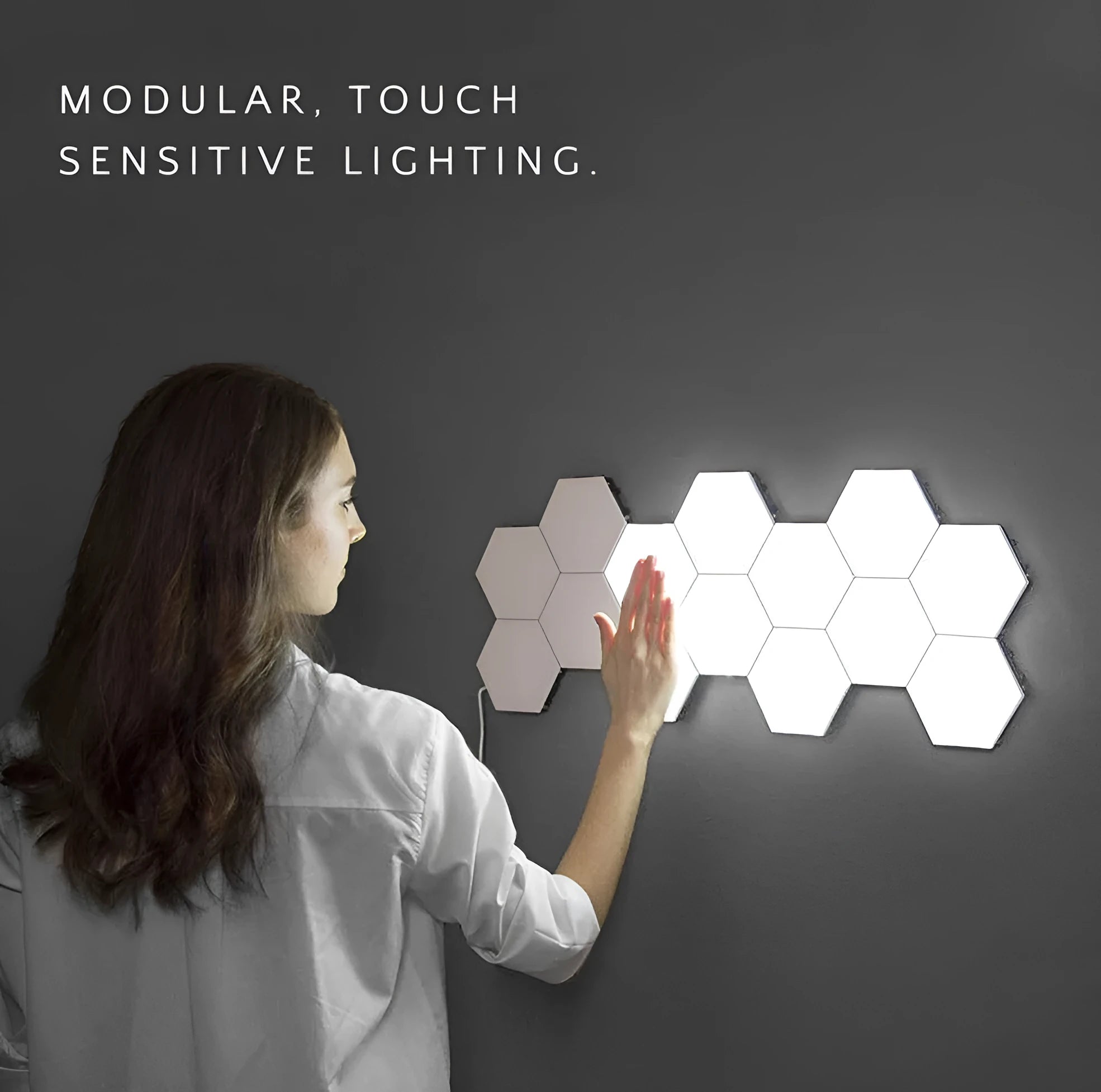 Helios modular honeycomb touch wall lamp modules in a geometric wall arrangement.