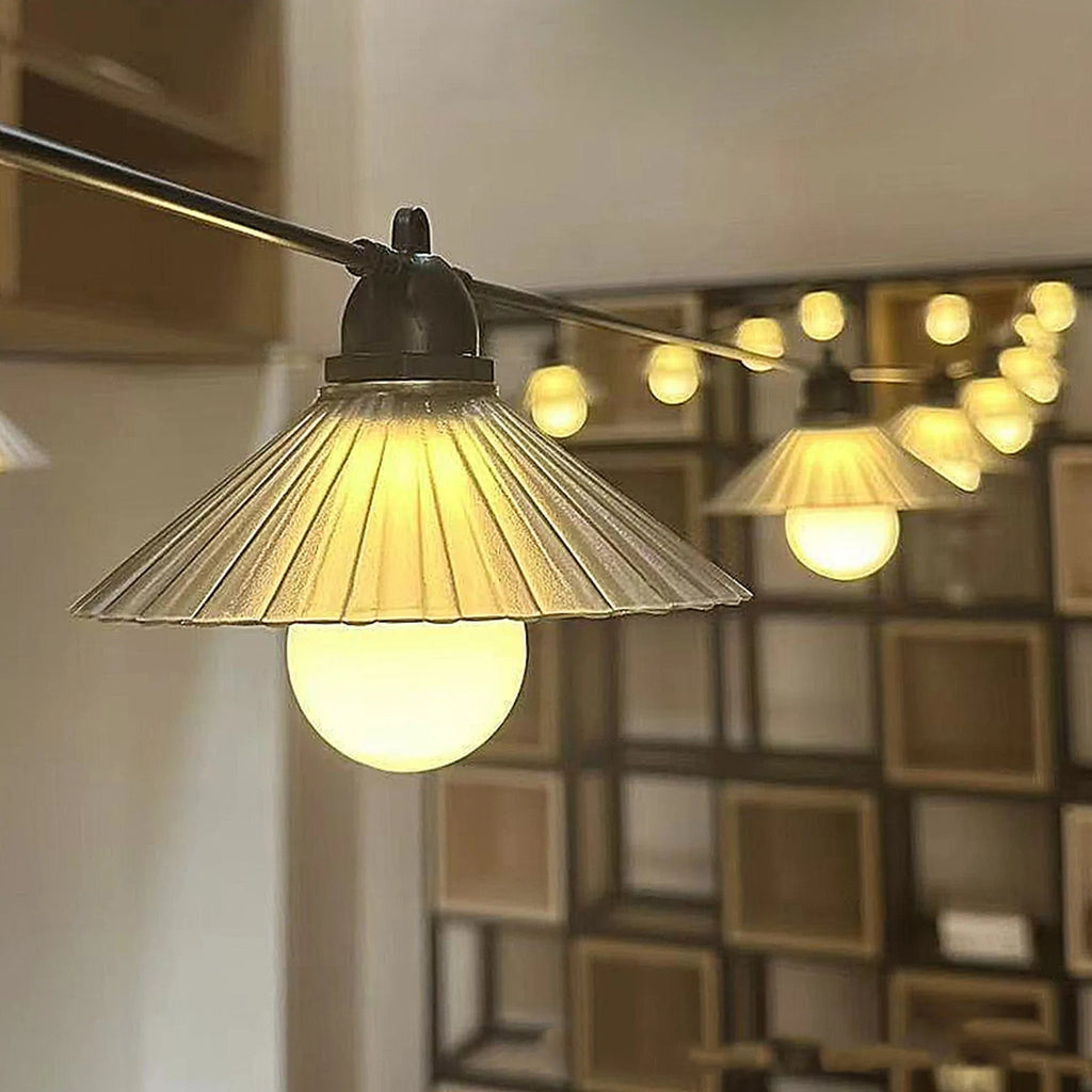 Outdoor waterproof LED string lights with flower-shaped globes in warm white and multi-colour options.
