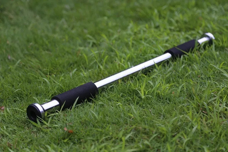 Steel adjustable pull-up bar extended for doorframe installation, showing parallel grips.