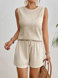Women's apricot sleeveless vest and matching shorts two-piece set on hanger