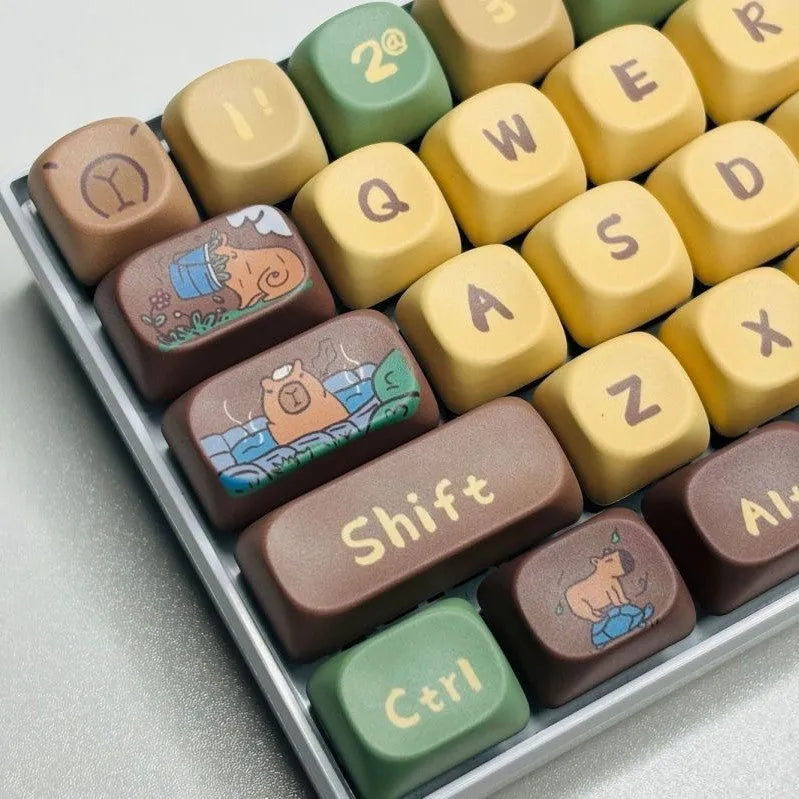 Capabala mechanical keyboard keycap set showing 130 double-shot ABS keys with uniform MOA height profile