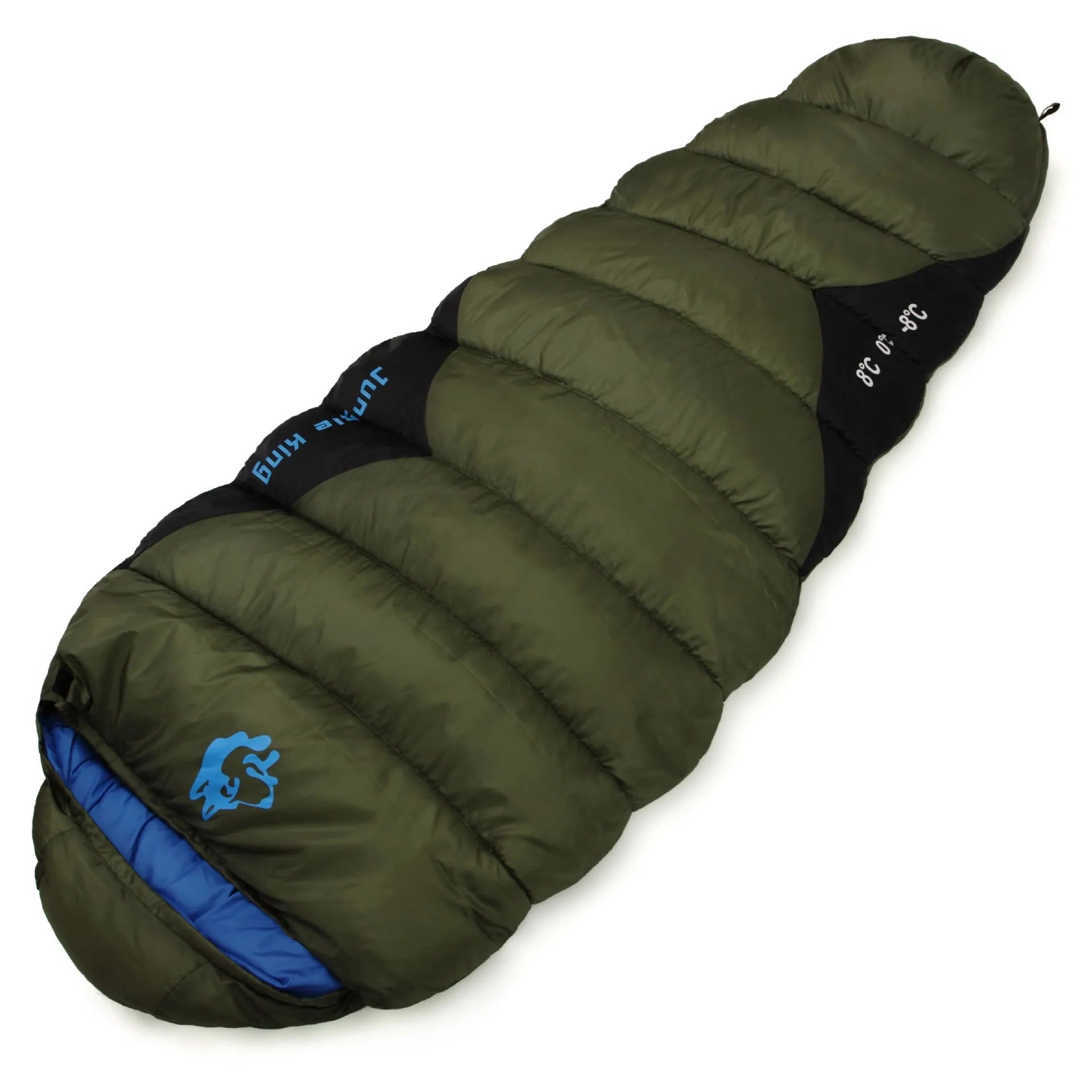 Outdoor cotton sleeping bag in army green with its compression storage bag laid alongside.