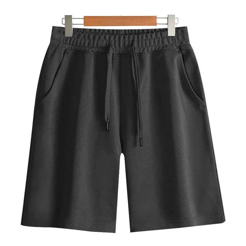 Cotton straight-leg summer shorts in light grey colour showing micro-elastic fabric texture