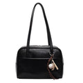 Women's urban simple PU bucket underarm bag with pendant detail in black, brown, coffee, and wine red colours.