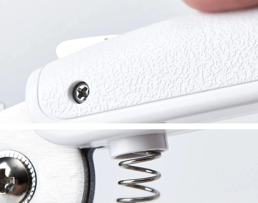White LED pet nail clippers with open anti-splash guard and nail file on a solid colour background